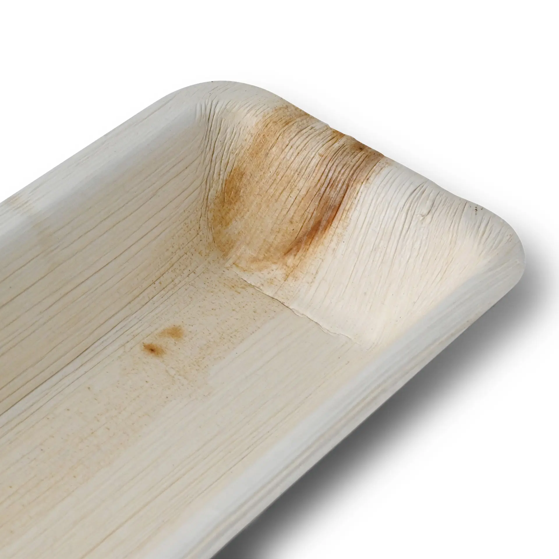 Vassoio in foglia di palma con grana unica; adatto per cibi caldi e grassi; forma rettangolare.