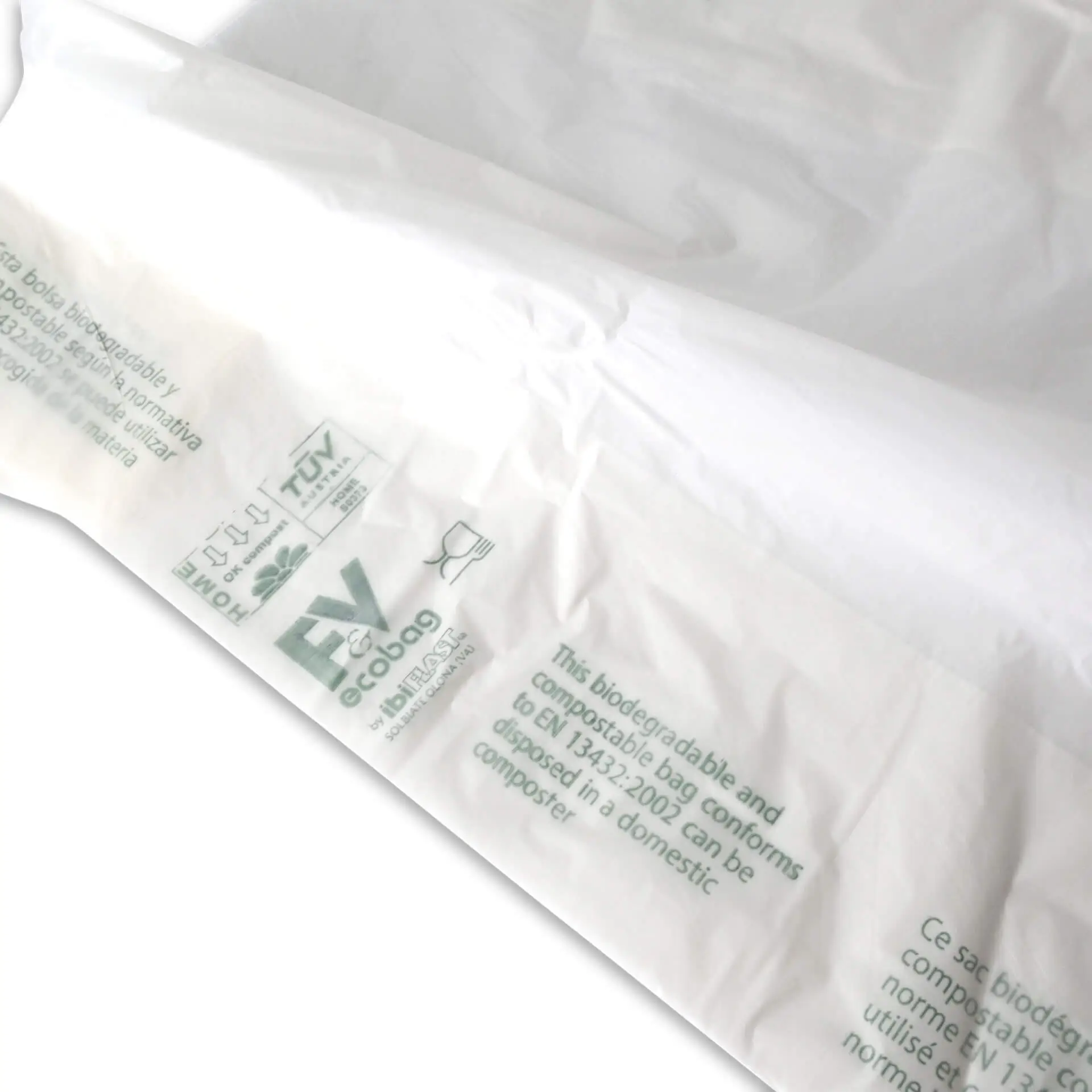 Busta per la spesa biodegradabile in bioplastica Mater-Bi®; con marcature ecologiche e dimensioni 22 + 13 x 50 cm.