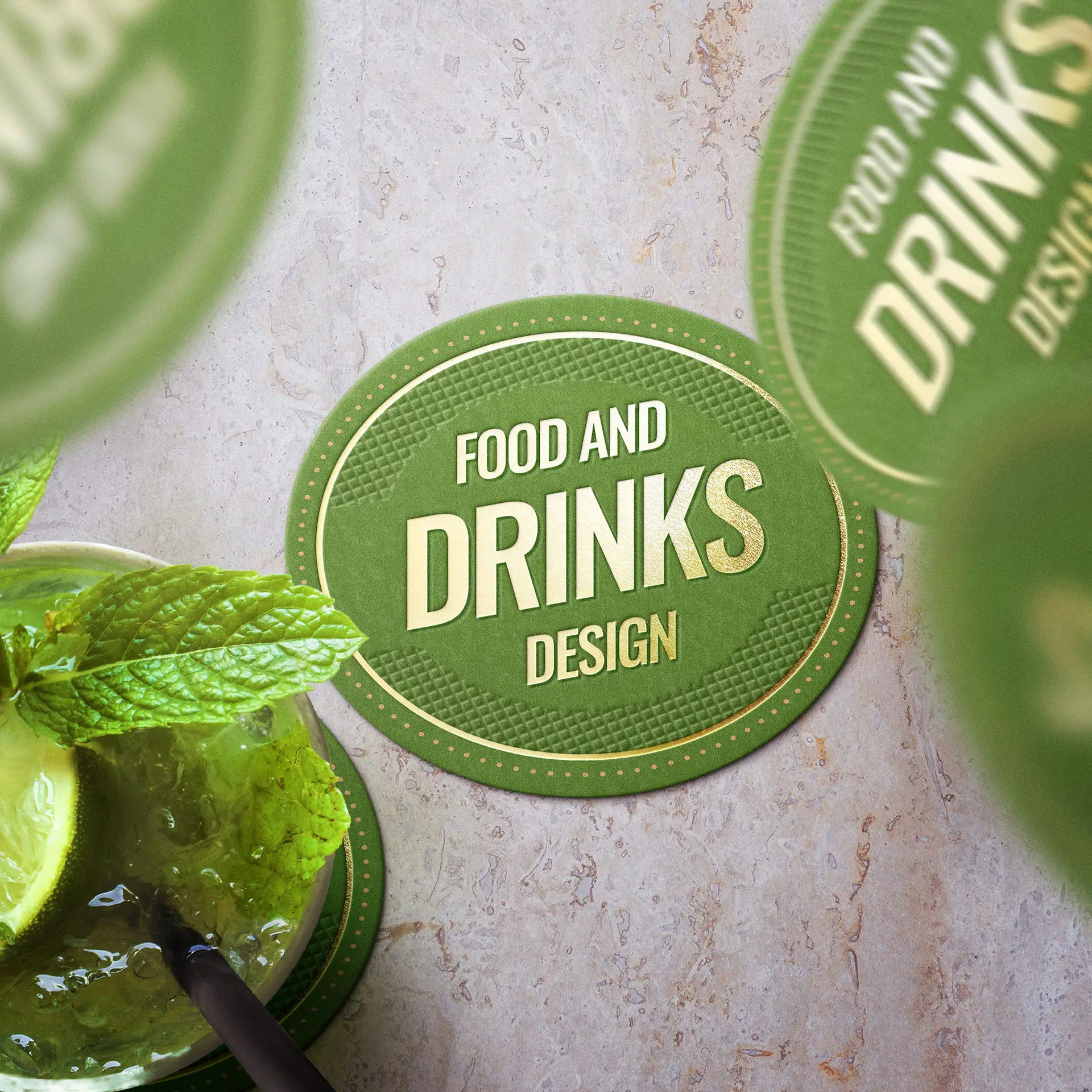 Sottobicchiere ovale stampato con la frase "Food and Drinks Design" su sfondo verde e testo decorativo.