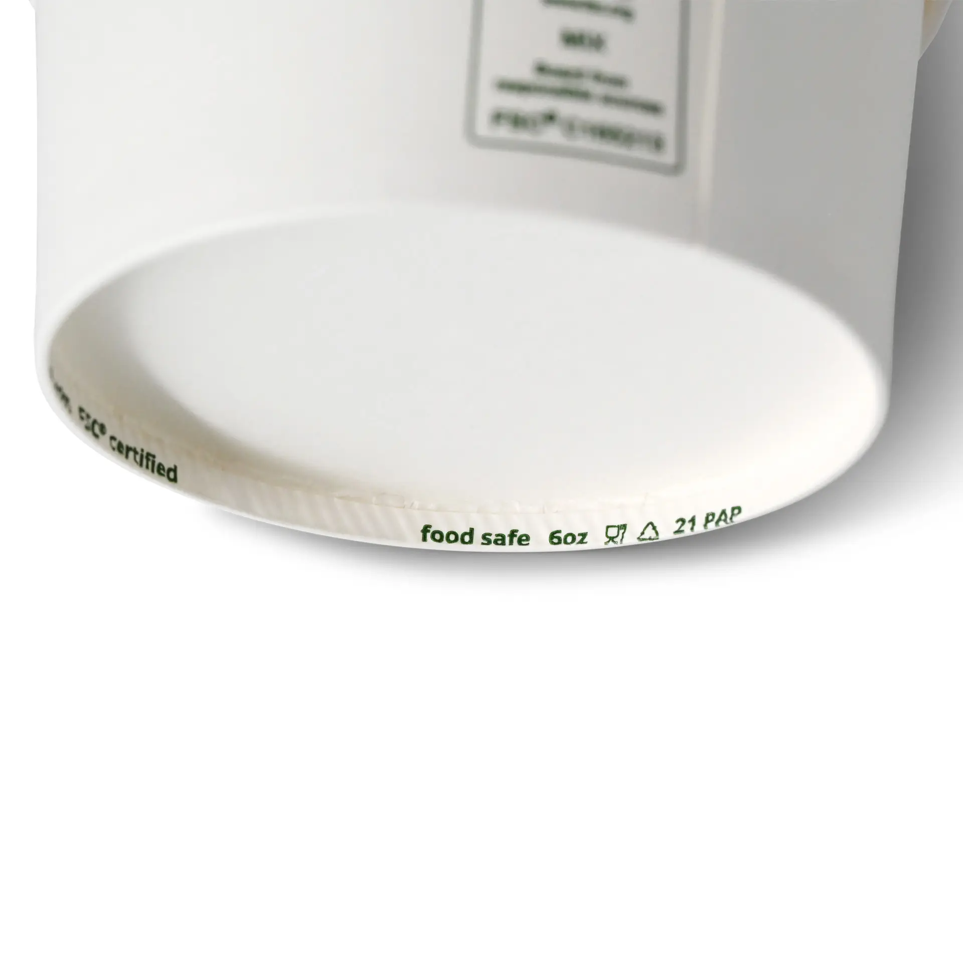 Coppetta per gelato in carta bianca con capacità di 6 oz; presenta marcature biodegradabili e certificate FSC sul bordo.