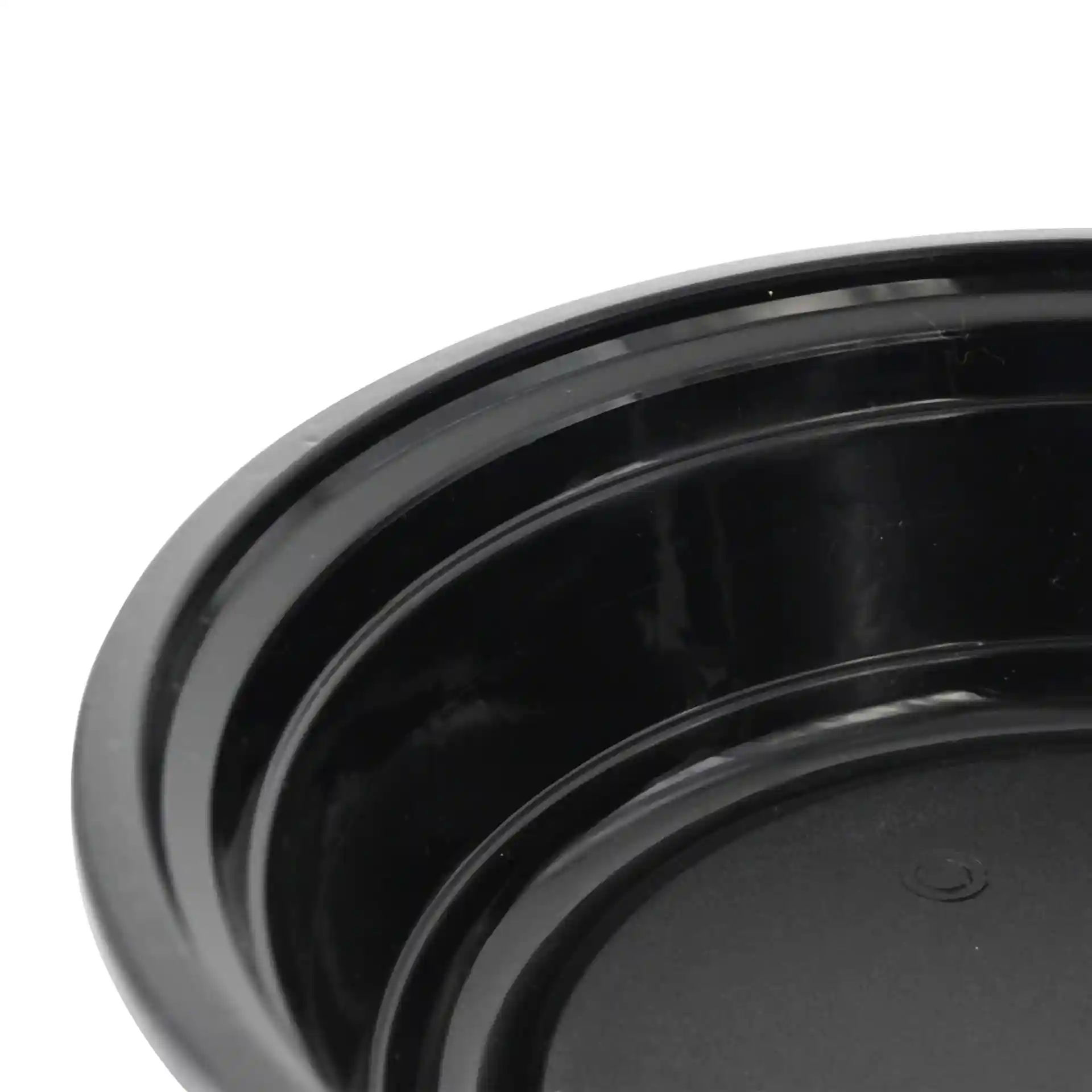 Piatto rotondo riutilizzabile nero con un diametro di 182 mm e un'altezza di 44 mm, con contorni interni.