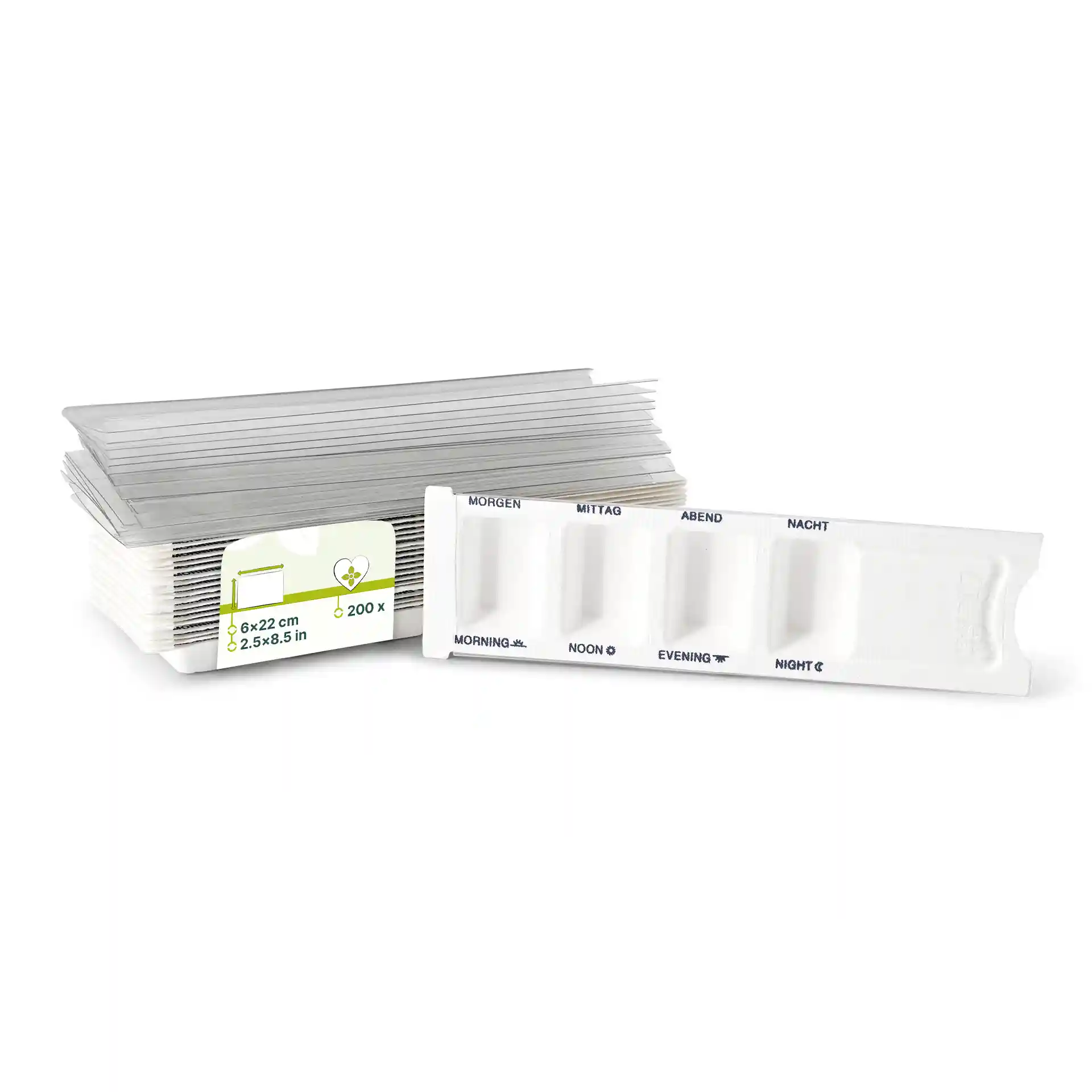 Dispenser di medicinali rettangolare bianco con quattro scomparti e un coperchio scorrevole, accanto a un mazzo di fogli trasparenti.