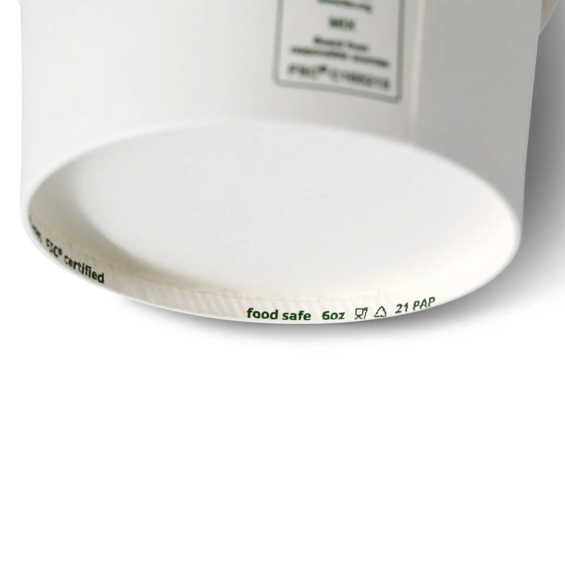 Coppetta per gelato bianca con un diametro di 92 mm e un'altezza di 48 mm, mostra il fondo con segni.