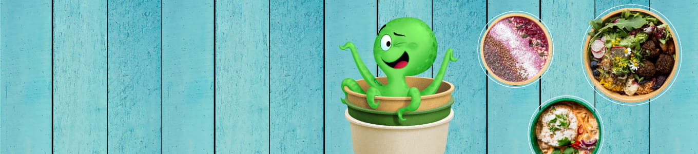 Personaggio cartoon con un volto verde sorridente seduto in una ciotola da asporto beige; tre piatti esposti accanto su uno sfondo di legno blu.