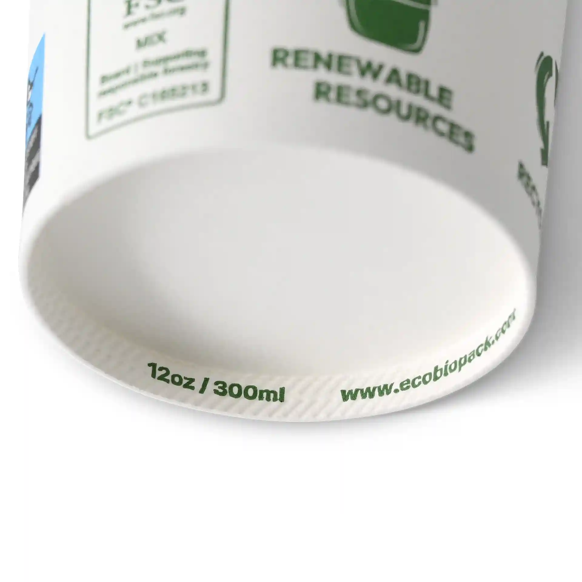 Bicchiere bianco con un diametro di 90 mm, con indicazioni per 12 oz / 300 ml e un link sul fondo.