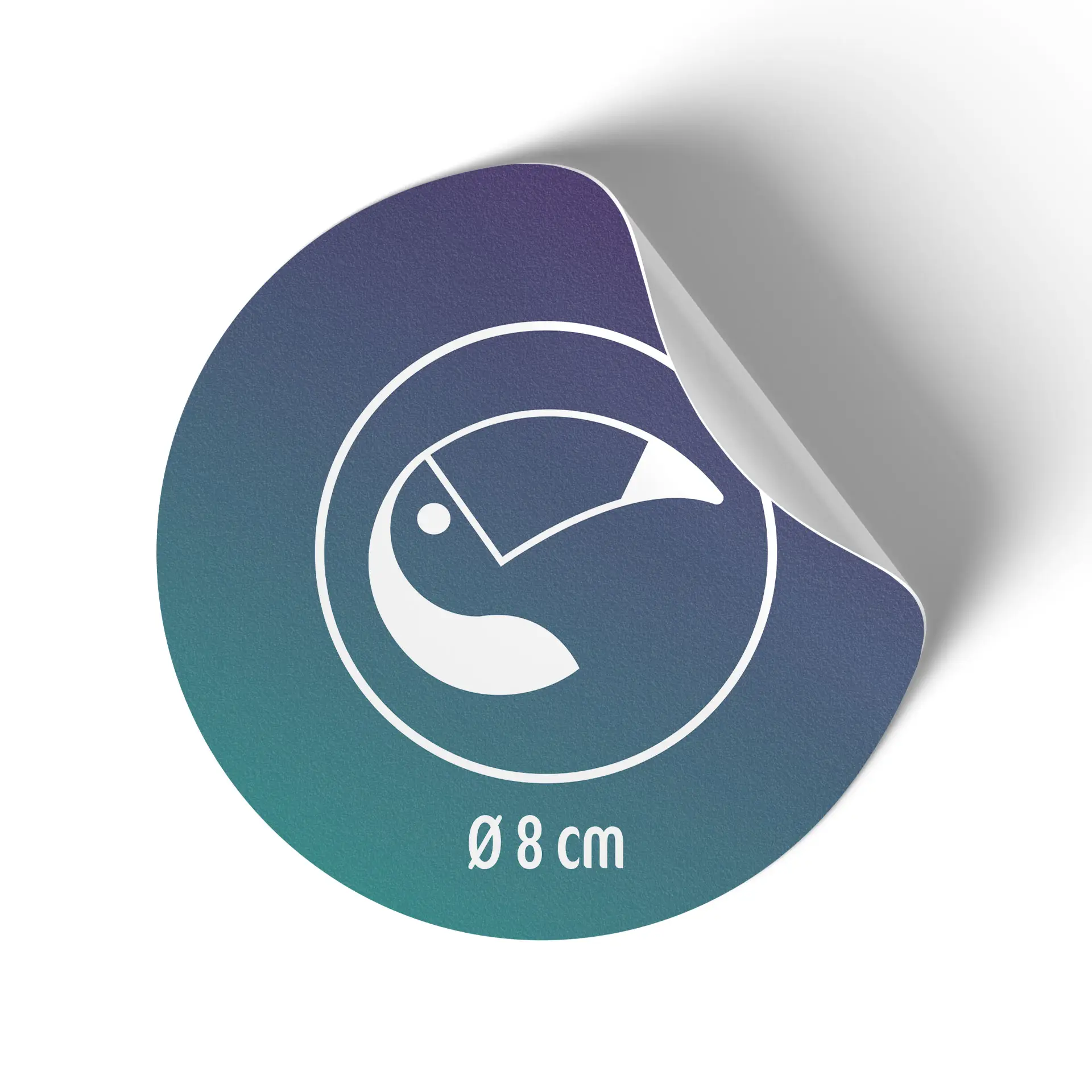 Adesivo decorativo rotondo con un design di un uccello stilizzato, dimensione Ø 8 cm, con uno sfondo sfumato.