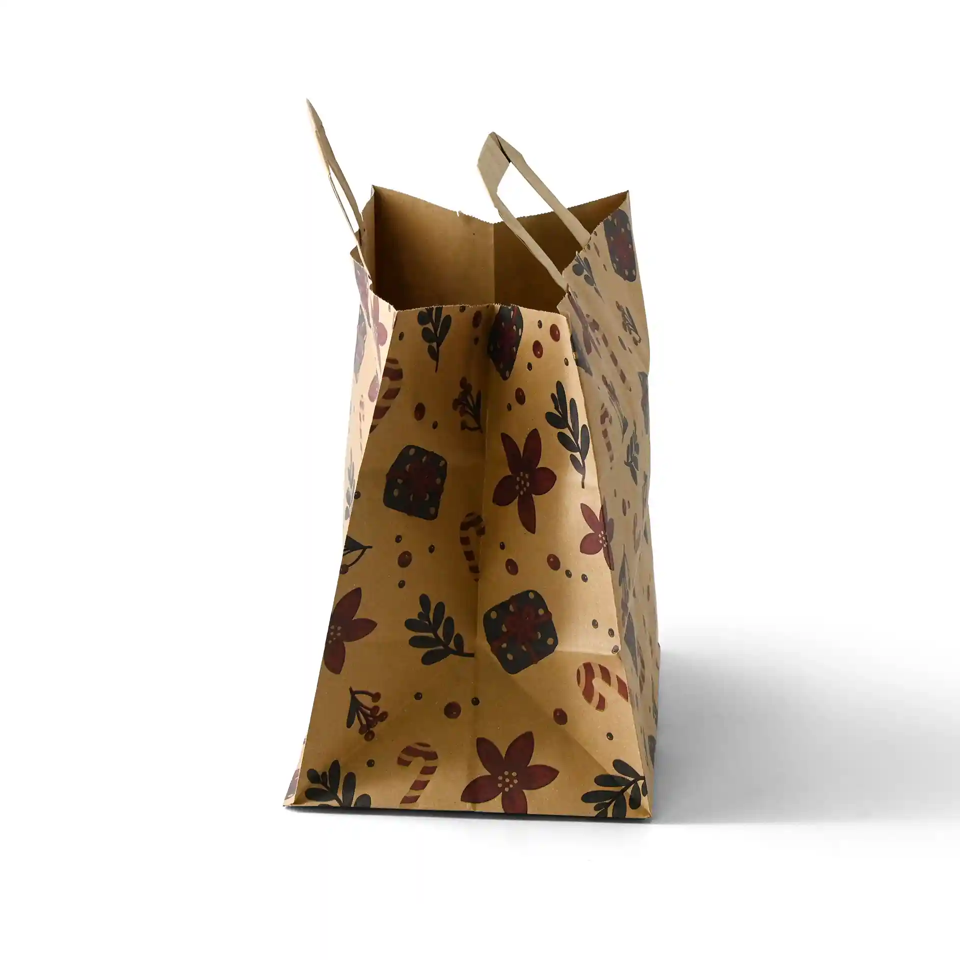 Borsa di carta marrone con design invernale, motivi floreali e regalo, base ampia, dimensioni 26 x 17 x 25 cm.