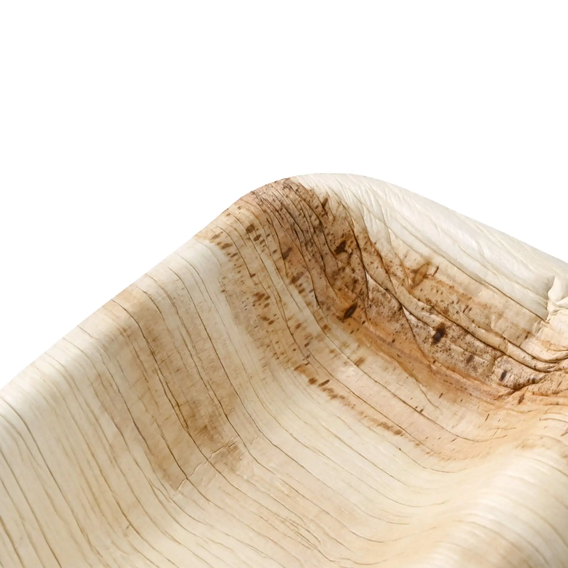 Piatto rettangolare in foglia di palma con venature naturali; presenta tre scomparti, leggero e resistente al grasso.